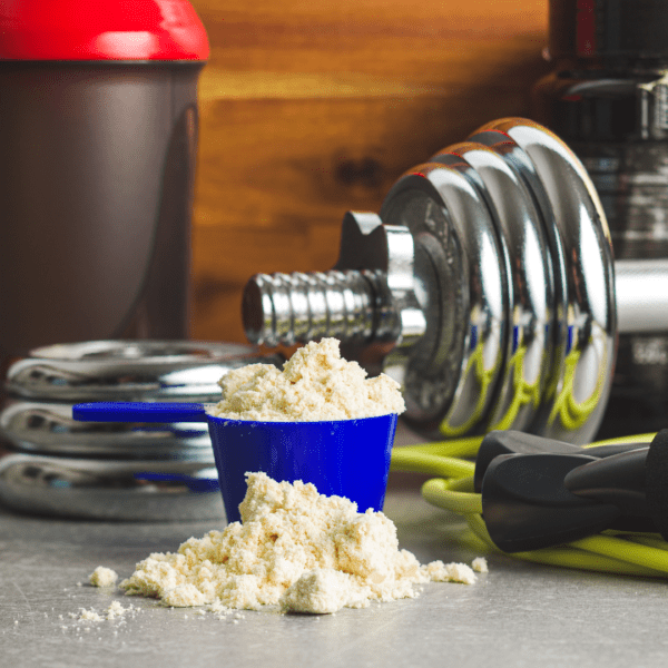 Whey Protein Powder with Gym Equipments