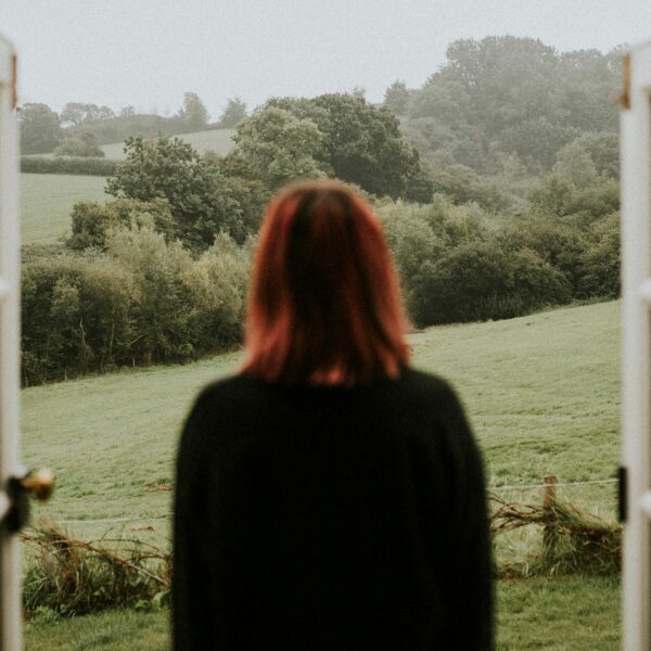 Woman's back looking at nature