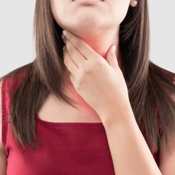 Woman touching her neck