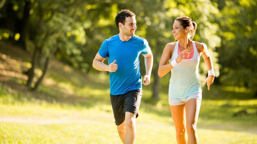 Woman and Man jogging at the park