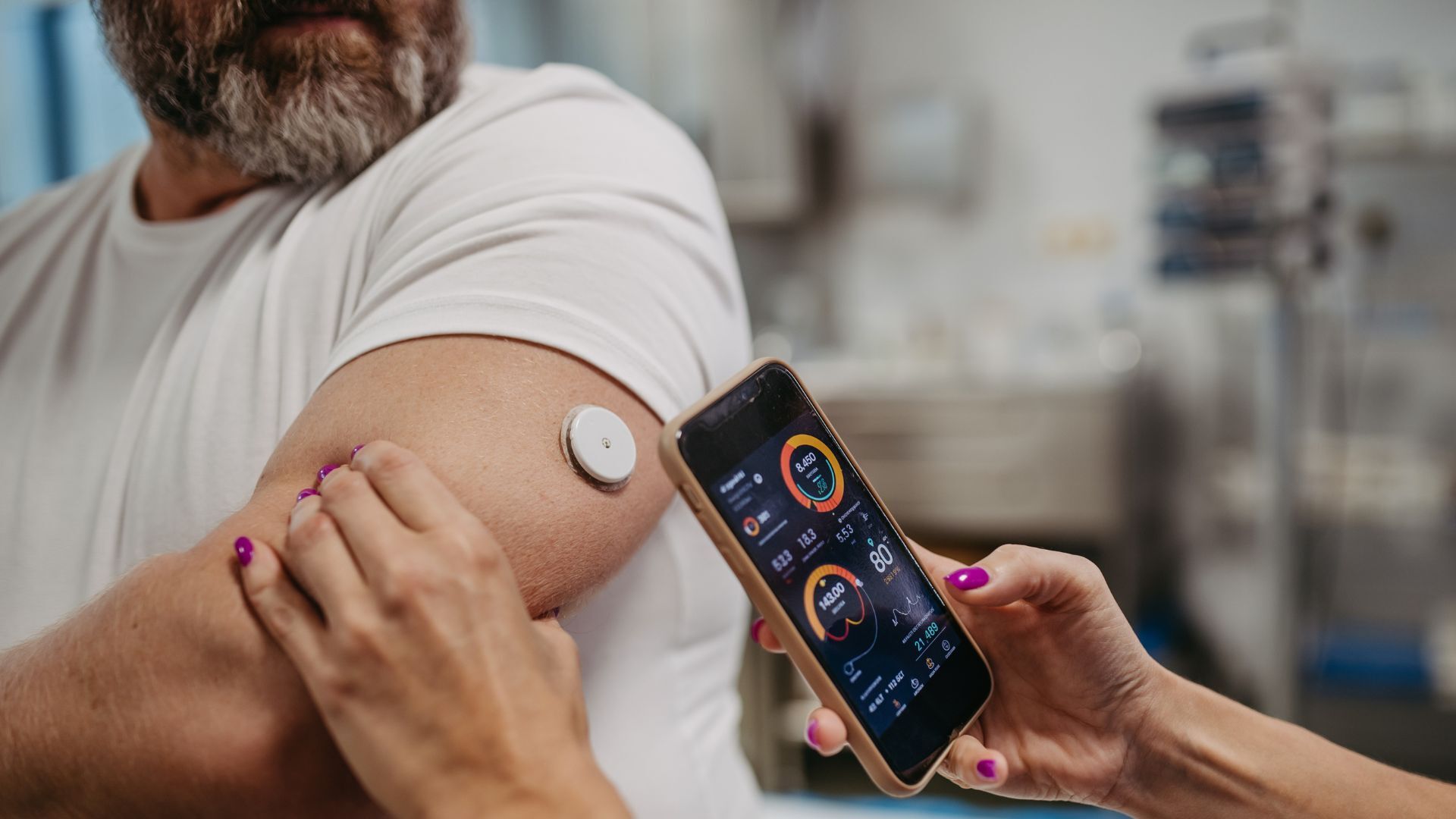 Man with a glucose monitor
