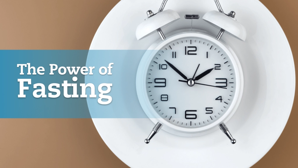 Alarm clock on top of a white plate