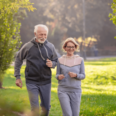 Man and woman jogging at the park