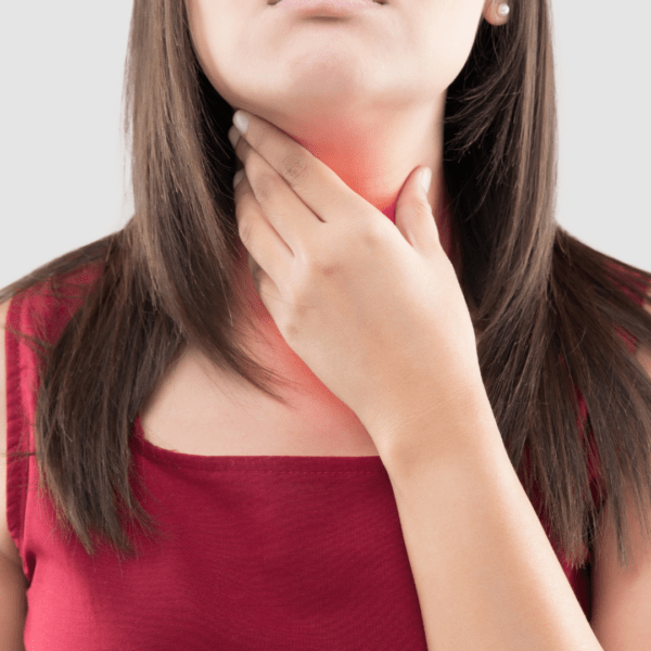 Woman touching her neck