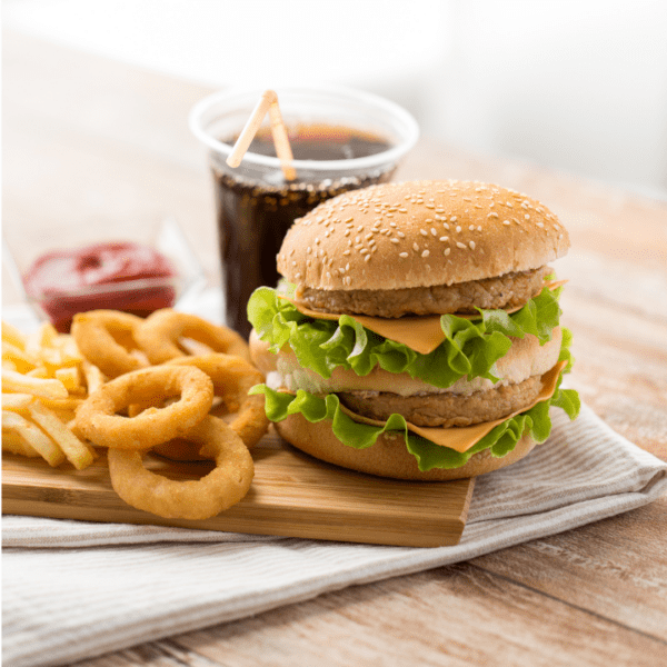 One burger, fried onion rings and soda