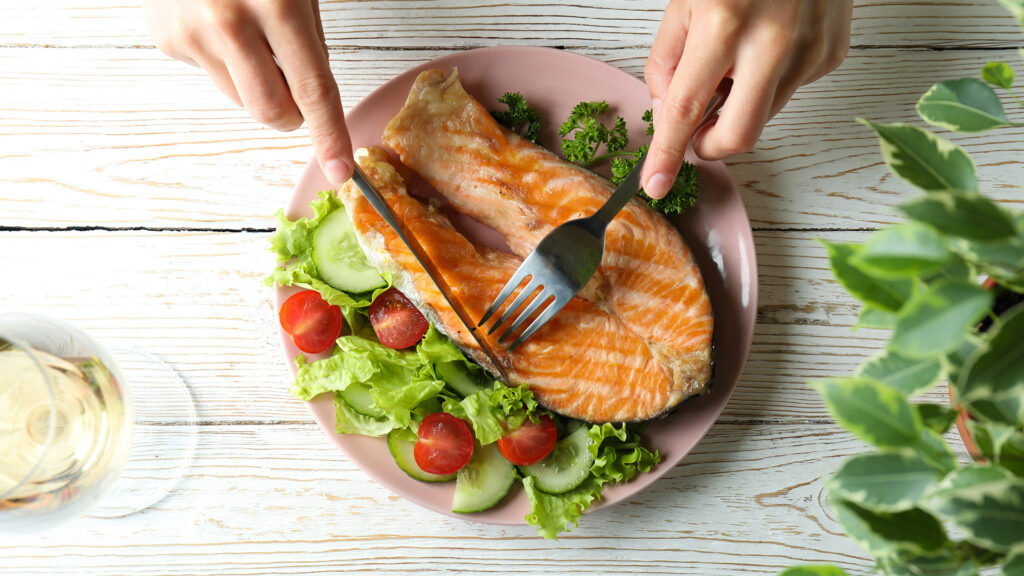 Cutting-Into-Salmon-on-Plate