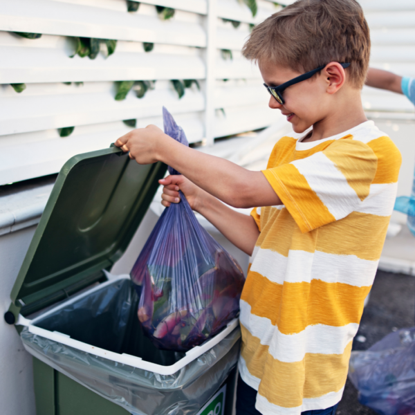 Kid taking out the trash
