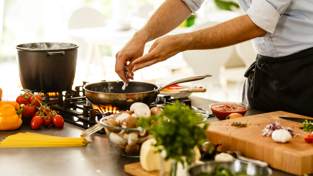 Man cooking a healthy meal at home