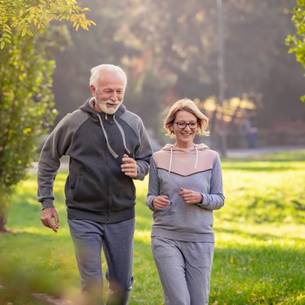 Man and woman jogging at the park