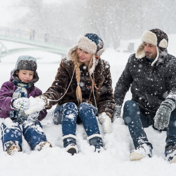 Family playing in winter