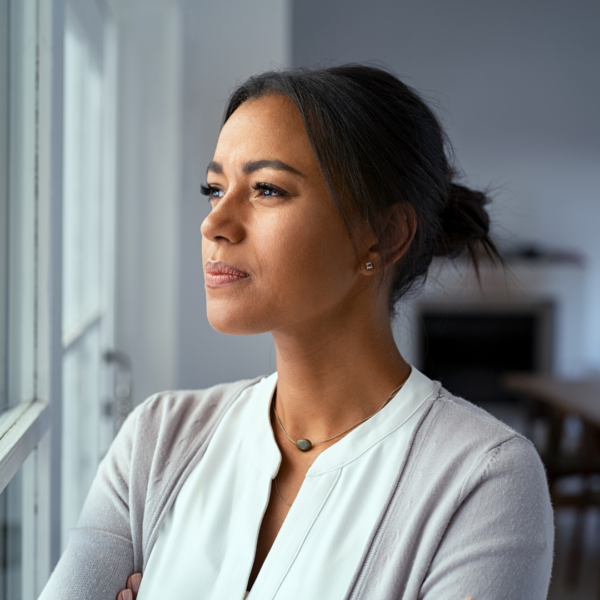 Woman looking outside the window