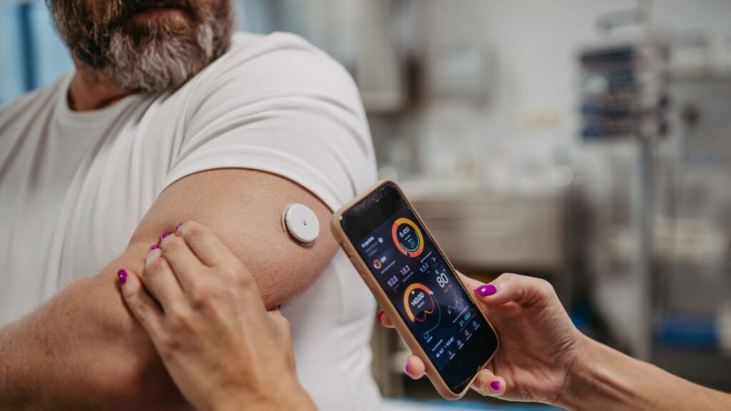 Man with a glucose monitor