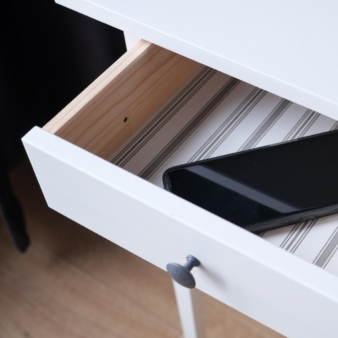 Mobile phone hidden in a drawer