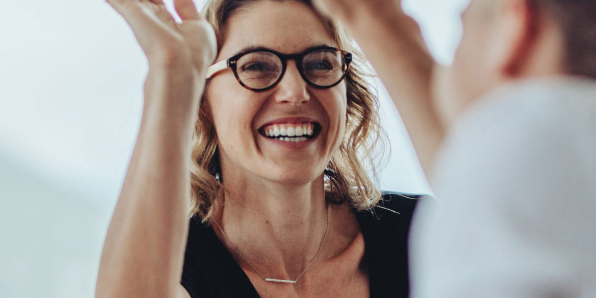 Happy-Woman-High-Fiving